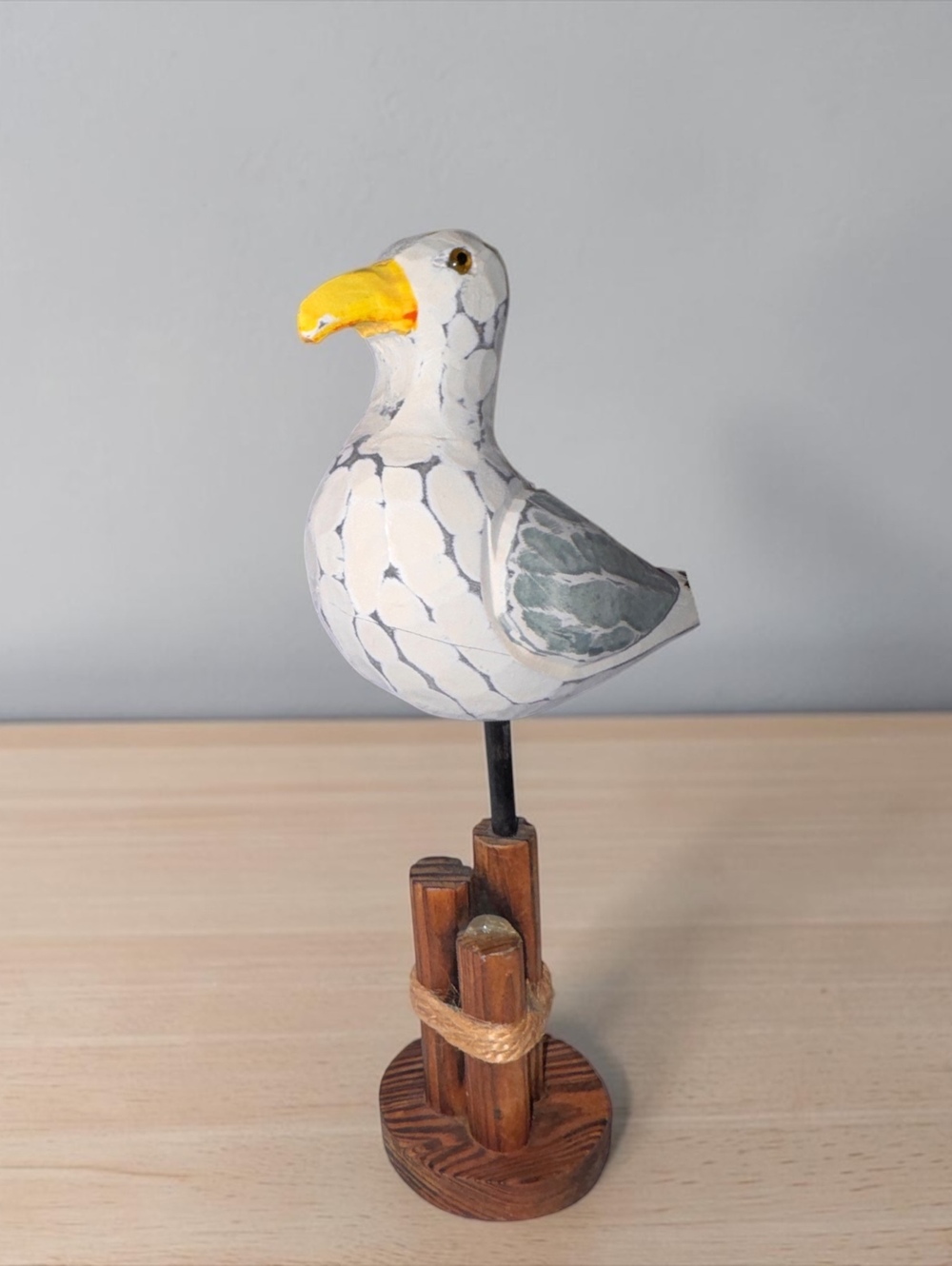 Hand-Painted Wooden Seagull Figurine on Rustic Post Stand